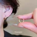 Crystal Pave Huggie Earrings in Three Metal Finishes view 3