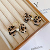 Ivory Leopard Bows