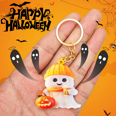 Halloween ghost beanie keychain held in palm on orange holiday graphic