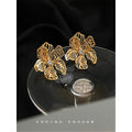 Gold Tone Openwork Flower Stud Earrings Clear Center Stone view 4