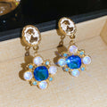 Blue Crystal Floral Cameo Drop Earrings With Polished Metal Details view 4