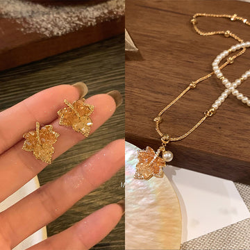 Gold Maple Leaf Necklace And Stud Earrings With Crystals