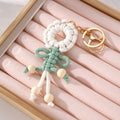 Gold Tone Woven Flower Doll Clip Keychains in Six Colors view 3