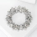 Open Floral Crystal Wreath Brooch in Red Blue or Pink view 3