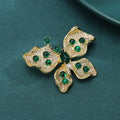 Green Crystal Butterfly Brooch With Polished Metal And Sculpted Decorative Details view 3