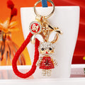 Jeweled Flower Dress Rabbit Keychains in Red Pink and Blue view 1