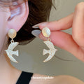 Hammered Swallow Drop Earrings And Crystal Bead Necklace view 3