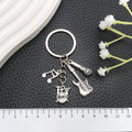 Silver Tone Guitar, Drum and Microphone Music Keychain view 4