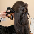 Large Burgundy Curved Open Triangle Hair Claw With Extra Gallery Colors view 4
