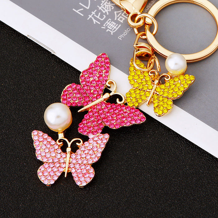 Three Butterfly Drop Keychains in Pink Yellow Purple and White Crystal Palettes