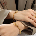 Gold Lotus Seed Pod Charm Necklace And Hoop Drop Earrings view 3