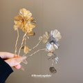 Gold Tone Flower Hair Pin With Textured Petals And Hanging Leaves view 2