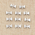 Small Bow Stainless Steel Connectors in a Silver Tone view 4