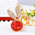 Jeweled Long Ear Fortune Medallion Keychains in Pink Red and Blue view 10