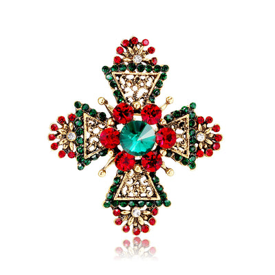 Front product view of the cross brooch pin in gold and red