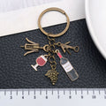 Four Finish Wine Opener Bottle Glass and Grape Keychains view 2