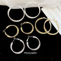 Textured Gold Tone Medium Round Hoop Earrings Jewelry view 2