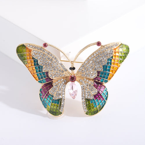 Gold multicolor enamel butterfly brooch with pink crystal abdomen