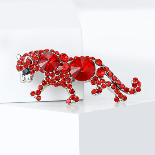 Red crystal leopard brooch on white display block side angle