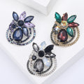 Floral Ring Crystal Brooch in Brown Black or Blue Colorways view 1
