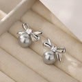 Polished Bow Pearl Drop Stud Earrings In Two Metal Tones view 3