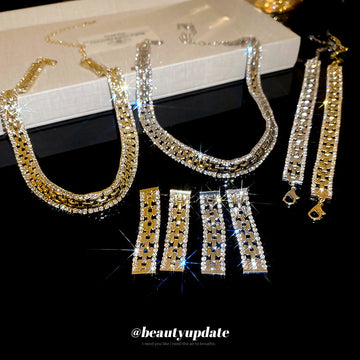 Gold Tone Double Row Geometric Crystal Link Bracelet