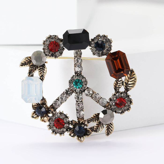 Multicolor Crystal Peace Sign Brooch With Faceted Crystals And Polished Metal Details