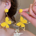 Layered Butterfly Drop Earrings in Yellow and White view 3