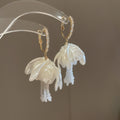 White Floral and Shell Drop Earrings with Beaded Tassels view 8