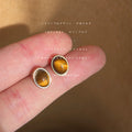 Gold Bezel Oval Tiger Eye Cabochon Stud Earrings Pair view 3