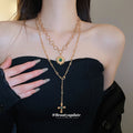 Layered Gold Tone Cross and Green Gem Pendant Necklace view 1