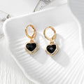 Gold Tone Faceted Crystal Heart Huggie Earrings in Eleven Color Options view 11
