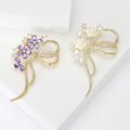 Long Tail Crystal Bow Floral Brooch in White or Purple view 1