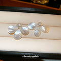White Petal Flower Stud Earrings with Pearly Centers view 2