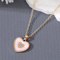 Gold Tone Crystal Enamel Heart Pendant Necklaces in Two Colors view 7