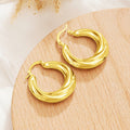 Rounded Ribbed Hoop Earrings in Silver and Gold Tones view 6