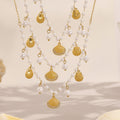 Pearl and Shell Charm Necklace in Gold or Silver Tone view 2