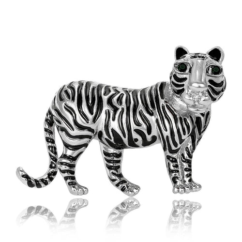 Angled display of the striped tiger brooch on a white surface