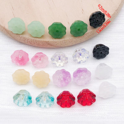 Glass lotus pod beads in ten colors arranged as a full product overview