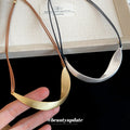 Curved Metal Bib Cord Necklace with Distinctive Textured Details view 4
