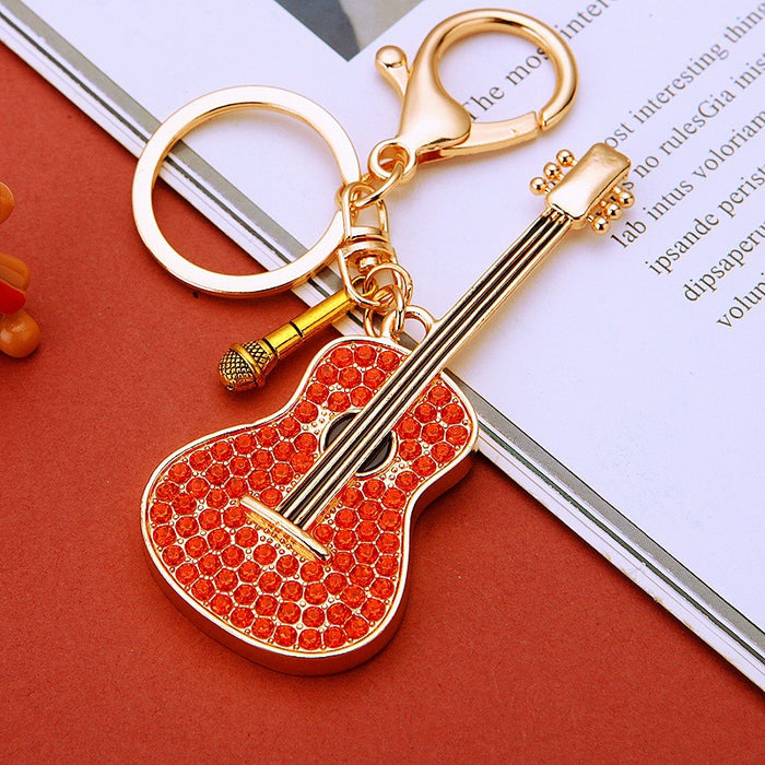 Jeweled Guitar Keychains in Red and Blue Pictured Colors