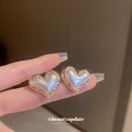 Sculpted Heart Stud Earrings In Pink And White With Polished Metal Tone Details view 2
