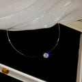 Clear Cord Round Crystal Pendant Floating Illusion Necklace view 1