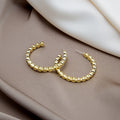Faceted Open C Gold and Silver Medium Hoop Earrings view 4