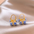 Mini Rose Basket Hoop Earrings in Two Floral Colors view 3