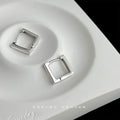 Silver Square Hollow Geometric Huggie Hoop Earrings view 3