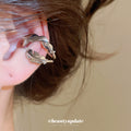Sculpted Feather Single Ear Cuff in Gold and Silver Tones view 3