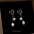 Gold Tone Open Heart And Double Irregular Pearl Drop Earrings view 4