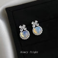 Silver Tone Bow Blue Opal Look Round Stone Halo Stud Earrings view 4