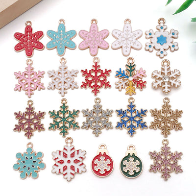 Colorful snowflake charms arranged on a light background